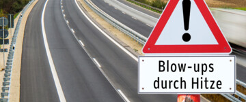 Blowups auf Autobahnen mit Warnschild im Vordergrund